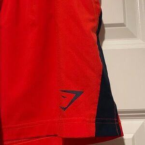 Gymshark orange Athletic Shorts with Navy Accents
